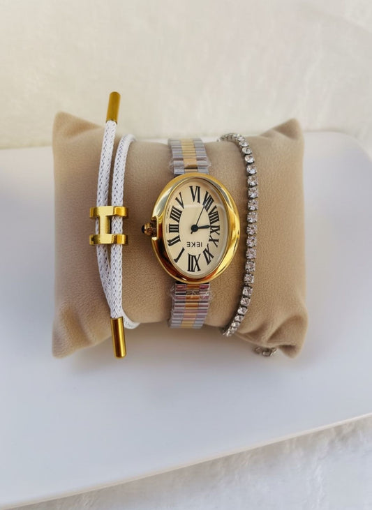 Elegancia Bicolor: Reloj Ovalado y Pulseras Modernas
